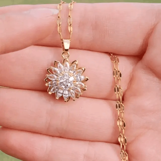 Collar Girasol Giratorio Aura™ – Belleza, calma y estilo en un solo detalle.